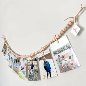 Photo display with 8 clothespins